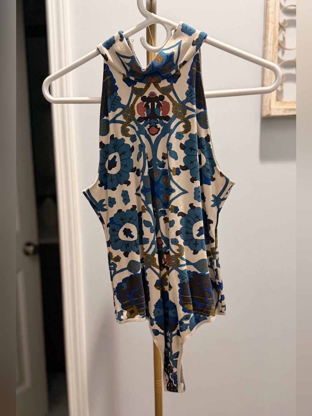 Free People High-Neck Cream Bodysuit with Blue Floral Tile Print